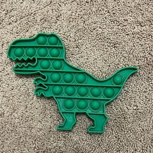 Dinosaur pop it! Great for fidgeting and has textured dino’s on it.